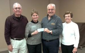 AARP President Presents Check To Friends Of WCDC