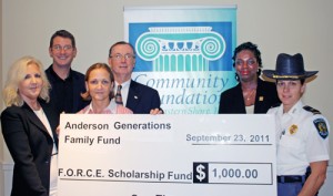 Community Foundation Of The ES Recieve Check For $1,000