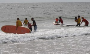 Surfer’s Healing Event Draws 225 Kid Surfers; Organizers Give Autistic Children Rare Opportunities To Learn About Ocean