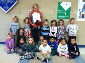 OC Pre-K Class Present Flowers And Thank You Book To School Guidance Counselor