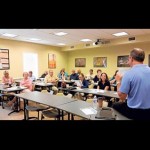 Some members of the Coastal Association of REALTORS® are pictured at a flood insurance seminar on July 17 at the association office in Berlin. Submitted Photos