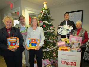 Coastal Association Of REALTORS® Collect Over 150 Toys During Toys For Tots Office Drive