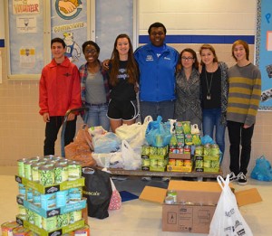 SD High School Student Government Association Members Box Canned Goods During Annual Food Drive