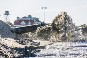 Dredged Sand Finding New Home On Resort’s Inlet Beach; Black Sand No Cause For Concern