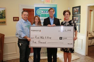 Red, White And BOOM Fund Receives $5,000 From Robinson’s Family Of Business