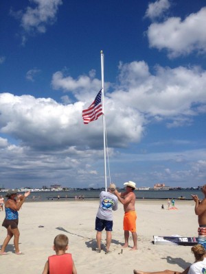 American Flag Raised On Bay Island Met With Cheers; Area Resident Joined By Others In Endeavor