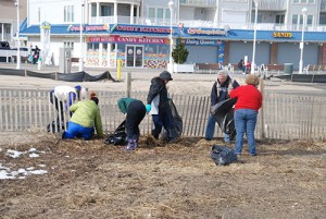 Team Of Citizen Volunteers Helping With Beach Clean-Up Effort