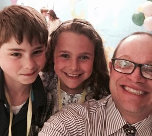 Rising Fourth Graders Take “Selfie” With Third Grade Teacher At Annual Third Grade Bridging Ceremony