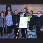 Seven clergy members stood together this week to sign a statement in opposition to hate and racism.