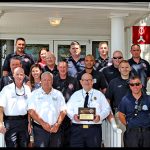 Long-time Deputy Chief Chuck Barton is surrounded by members of the Ocean City Fire Department after being recognized by the town on the occasion of his retirement. Submitted Photo