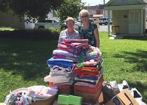 Seamstresses And Supporters Of Pillowcase Ministry Program Meet At Go Organic To Share Work And Donations