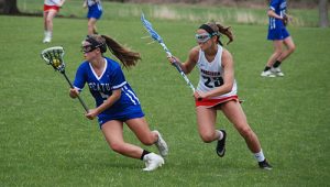 Decatur Girls Pull Away From Worcester, 13-7