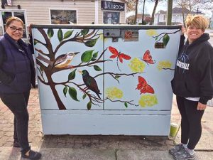 Volunteers From The Art League Of OC Paint Utility Box On Wicomico Street And Baltimore Avenue