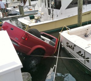 Truck Jumps Curbs, Ends Up In Marina
