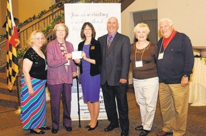 Volunteers From Star Charities Present $1,400 Check To Alzheimer’s Association Of Salisbury
