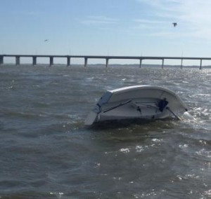 Two Boaters Rescued By Coast Guard From Capsized Sailboat