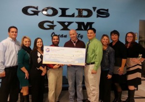 Balwin Jr. Of Gold’s Gym Presents United Christmas Spirit Campaign With Check