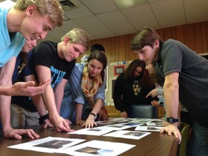 Worcester County Youth Council Review Photographs Associated With New Community Awareness Project