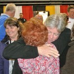 Lloyd Martin, pictured hugging a supporter, finished in third place in this year’s election. Martin was the top vote-getter in the 2010 and 2006 elections. Photo by Joanne Shriner