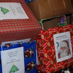 Various donation boxes spread out through the community were packed up and loaded away from the Santa House’s temporary location on Monday morning.