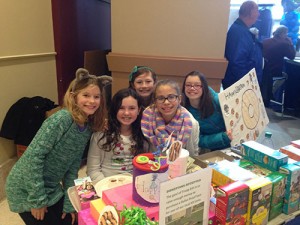 Local Students Sell Girl Scout Cookies At Seaside Boat Show