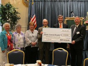 Auxiliary Presents AGH With $180K