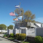 Before and after photos of the flag poles at the Hidden Harbour II residential community are shown. Submitted Photos