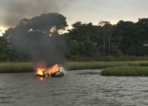 Seven Uninjured After Boat Fire