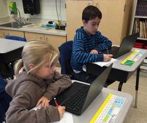 OC Elementary Fourth Graders Use Laptops To Do Research For Their Non-Experimental Science Fair Project