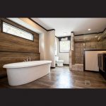 Qualify craftsmanship is featured throughout homes being sold by Atlantis Homes, such as this modern bathroom.