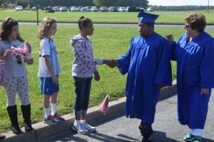 Two Cedar Chapel Students Get A Thrill Participating In Graduation Walk