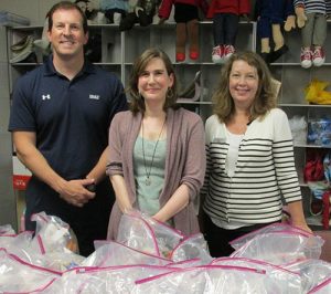 BB&T Bank Employees Purchase And Assemble Emergency Food Bags And Hygiene Kits For Worcester County GOLD