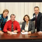 Dr. Walter Gianelle, Your Doc’s In President/CEO, seated left, and Dr. Peggy Naleppa, President/CEO of the Peninsula Regional Health System, seated right, signed a partnership agreement that will created a Your Doc’s In urgent care center near Salisbury University owned and operated by the two healthcare leaders.  Joining them at the signing ceremony are Angela Gianelle, Chief Financial Officer, Your Doc’s In, and Steve Leonard, Vice President of Operations Optimization and Innovation at Peninsula Regional Medical Center. Submitted Photo