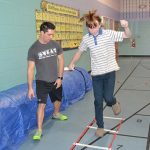 About 40 professionals attended last weekend’s College and Career Fair at Stephen Decatur Middle School. Above, Drew Berke of Powerhouse Gym and S.W.E.A.T. tracks a student’s time in a small obstacle course. Photos by Charlene Sharpe