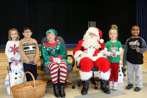 Santa And Mrs. Claus Visit OC Elementary