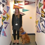 Guidance counselor Jess Bova is pictured with Pocomoke High therapy dog Rudy. 