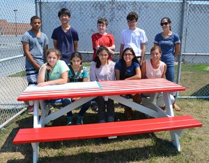 Local Students Paint Picnic Tables For Berlin Events