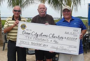 Macky’s Bar And Grill Owners Donate $10,000 To OC Lions’ Wound Troops Fund