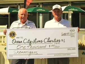 Shenanigan’s Irish Pub Presents OC Lions With $1,000 Check