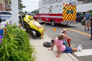 Two Injured In Rented Scoot Coupe Accident