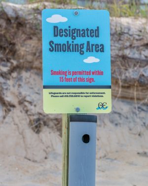 OC Smoking Ordinance Enhanced; Enforcement, Butt Receptacles Questioned