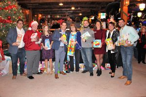 Coastal Association Of REALTORS® Members Donate To Toys For Tots