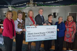 AGH Auxiliary Presents Hospital Officials With $40,000 Check