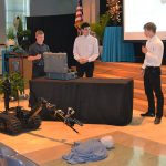 Wor Tech students demonstrate how tool works with bomb squads robot