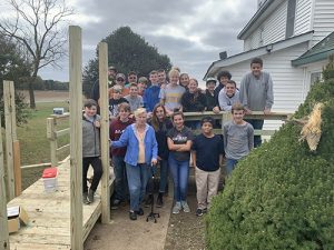 MBS Eighth Graders Work With Chesapeake Housing Mission Building a Handicap Ramp For Westover Woman