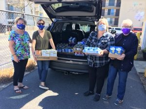 Rotarians Donate To Food Pantry
