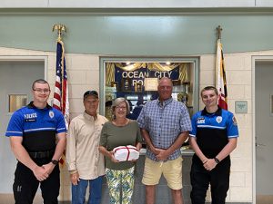 OC Surf Club Presents Dunkin Gift Cards To OCPD
