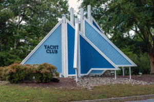 Pines Revives Yacht Club’s Sail Entrance Sign